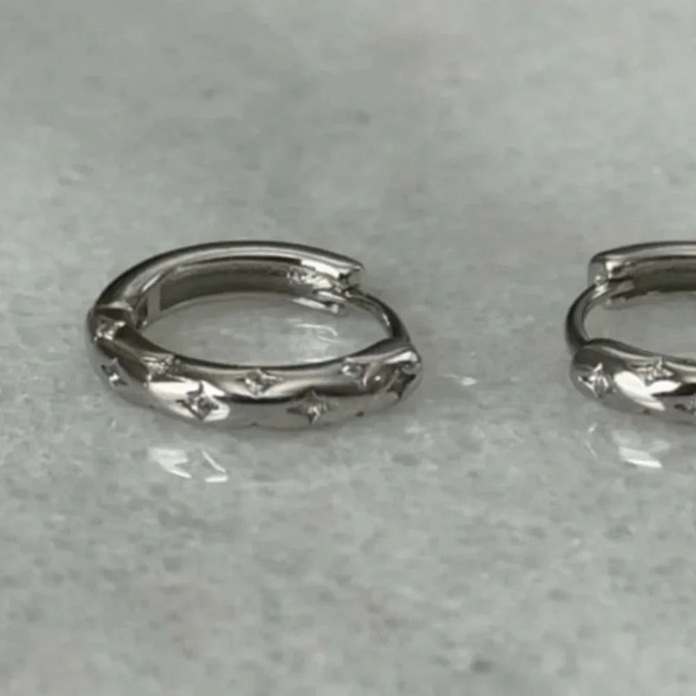 Sterling Silver Star Crystal Pave Hoop Earrings

Brand New - Picture 3 of 5